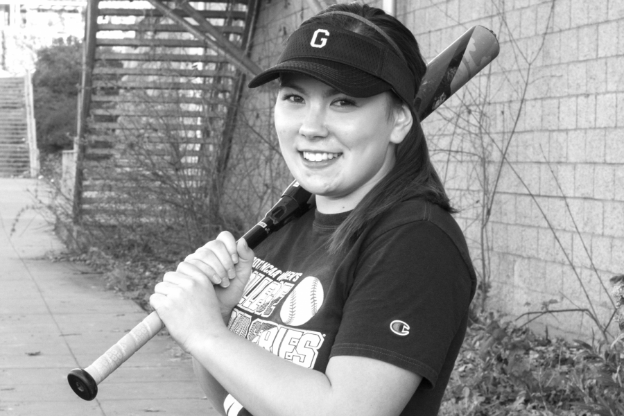 senior captain Josie Barker sports a softball bat